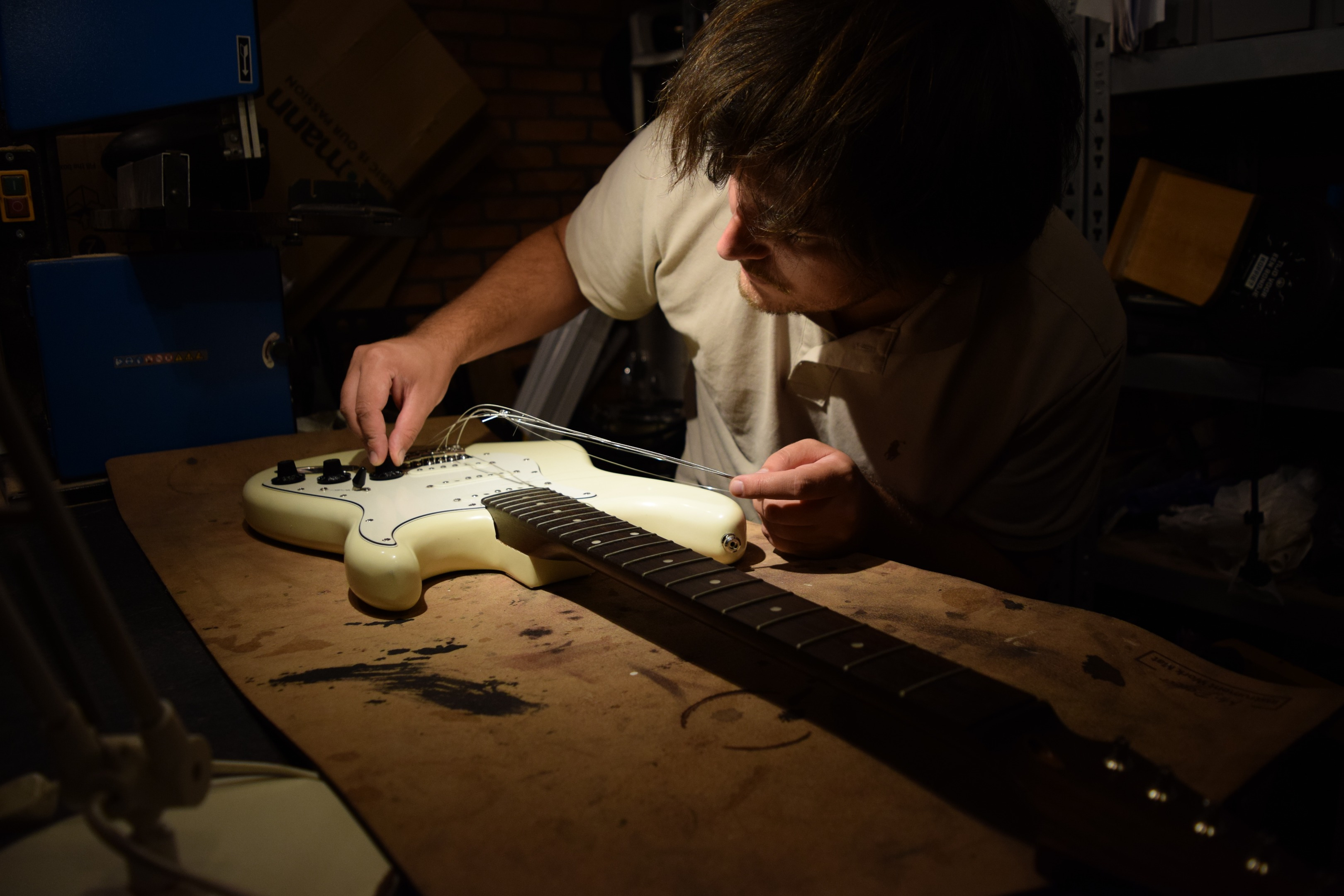 Luthier at Time Wizard Custom Guitars workshop